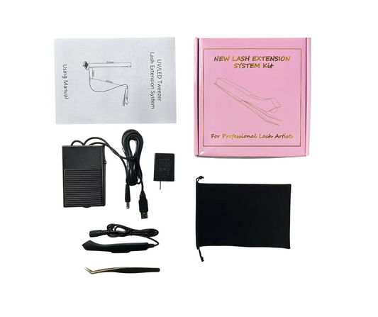 Lash extension system kit laid out on a white background, including a pink product box, black power adapter, USB cable, black tool, tweezers, and a small black pouch. The box reads 'NEW UV LASH EXTENSION SYSTEM KIT' and the manual says 'Using Manual' with a diagram.